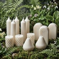 Velas en tonos beige y café 